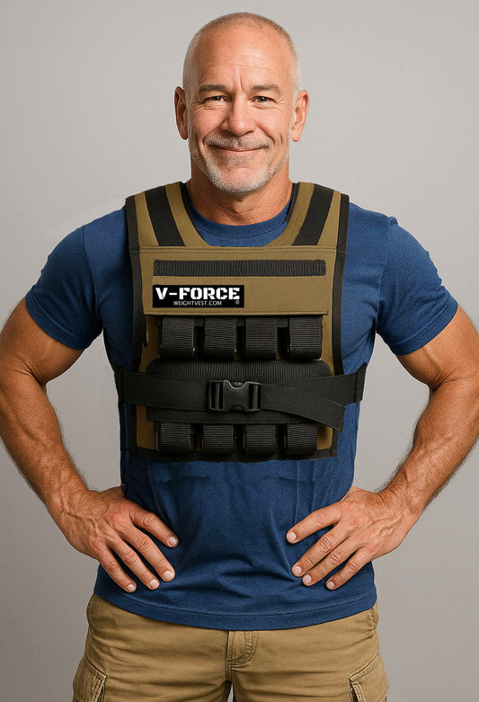 Man aged 64 wearing tan V-Force weight vest while wearing blue t-shirt and tan cargo shorts